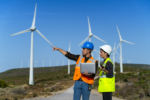 Young maintenance engineer team working in wind turbine