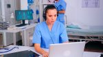 Professional therapist prescribing treatments for patients during telehealth